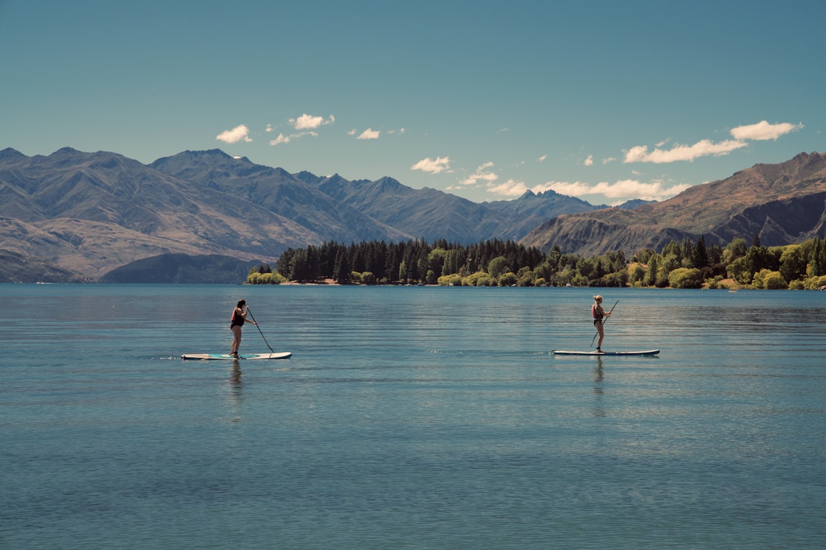 Two paddlers cruising on flat water