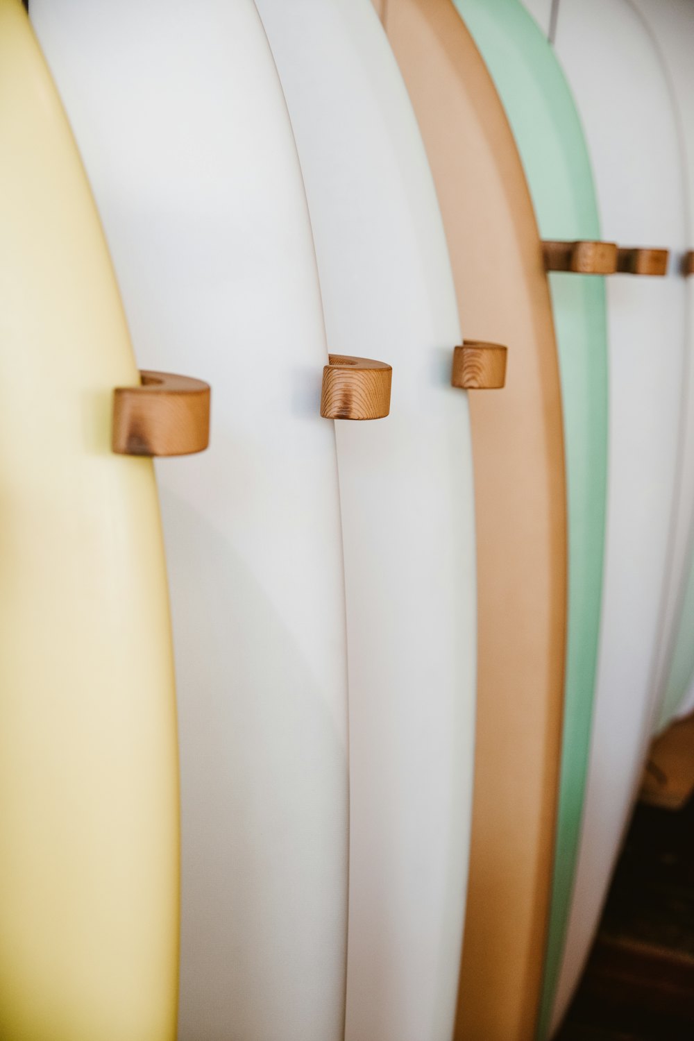 A row of boards racked against a wall